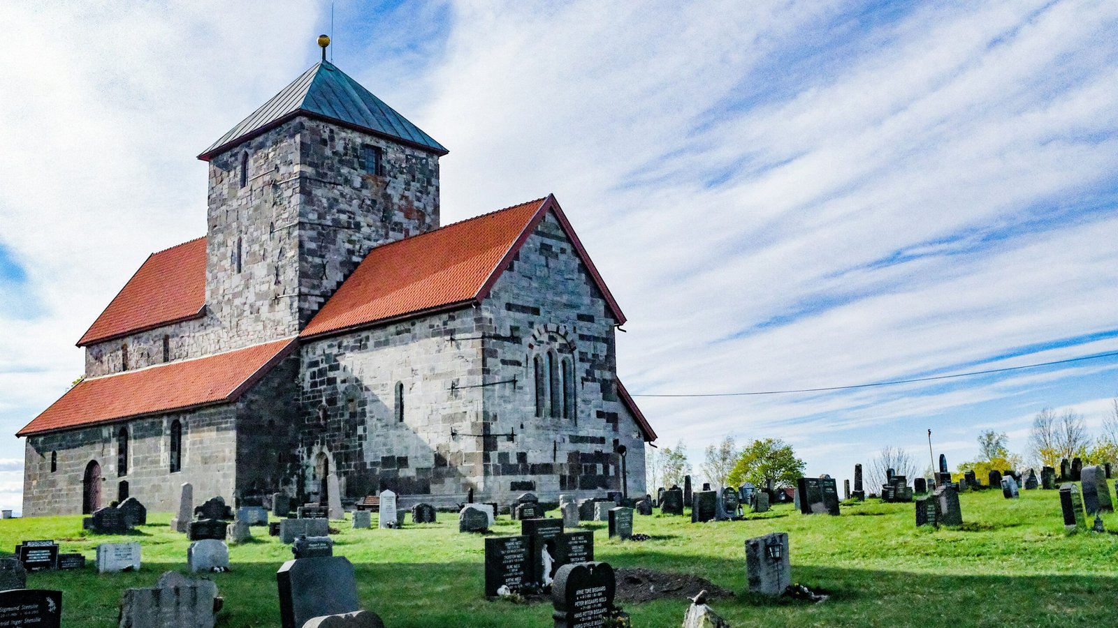 a cemetery with a church